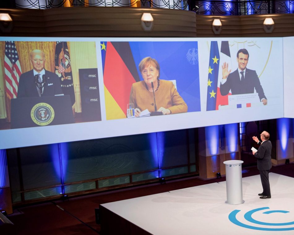 U.S. President Joe Biden, German Chancellor Angela Merkel and French President Emmanuel Macron at the Munich Security Summit