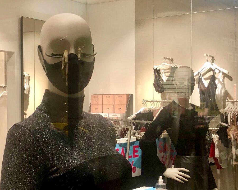 Mannequins with face masks in a Swiss shop