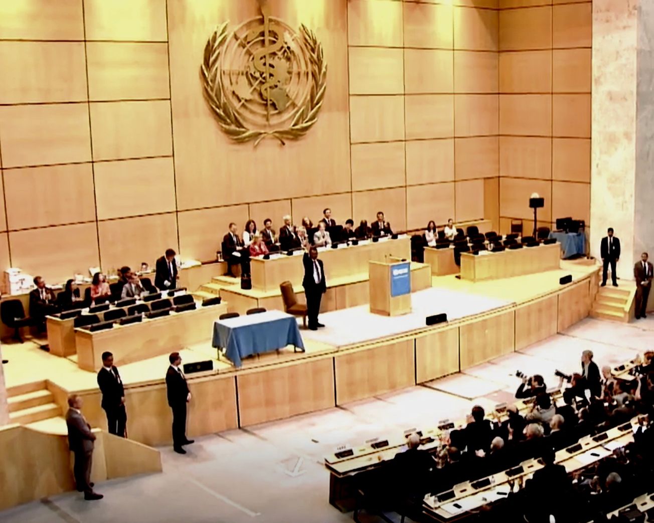 WHO Director-General Tedros Adhanom Ghebreyesus waves to delegates at the opening of the World Health Assembly.