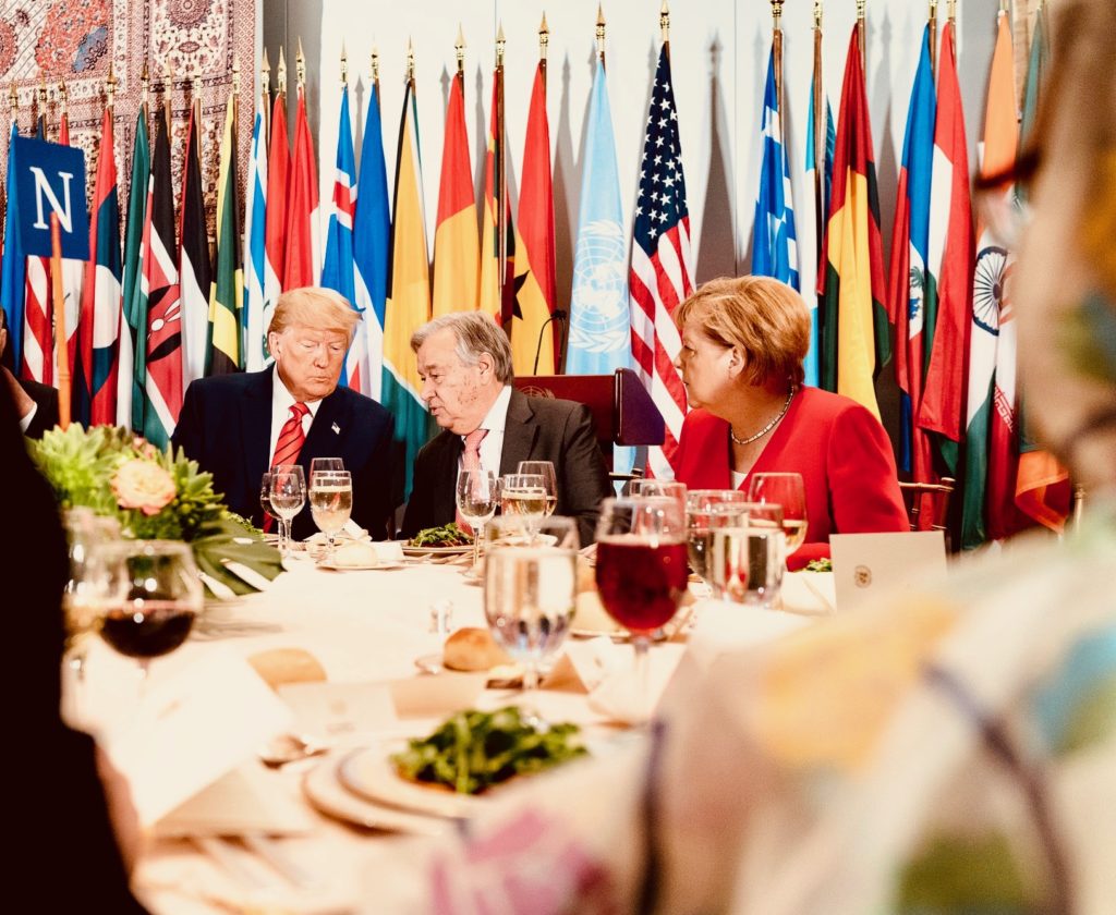 U.N. Secretary-General António Guterres with U.S. President Donald Trump and German Chancellor Angela Merkel