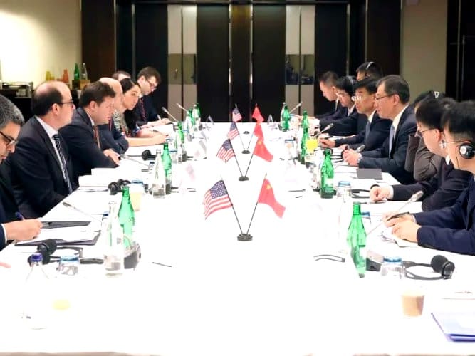 Chinese and American officials meet in Geneva to discuss AI's future.