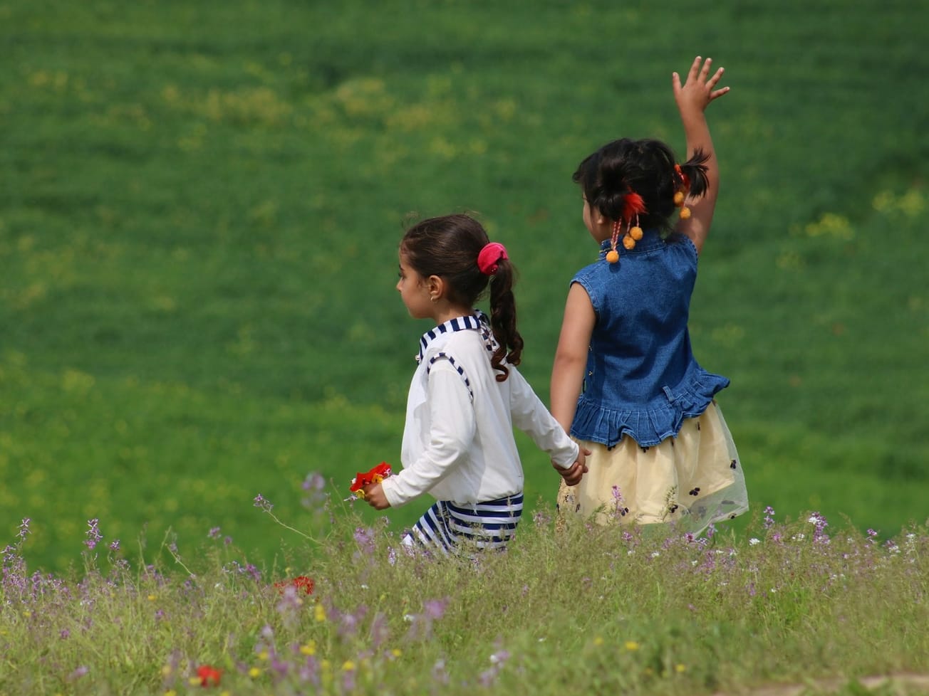 Two girls in Afghanistan's in Sar-e-Pul Province in Feb. 2021, a half-year before the Taliban takeover.