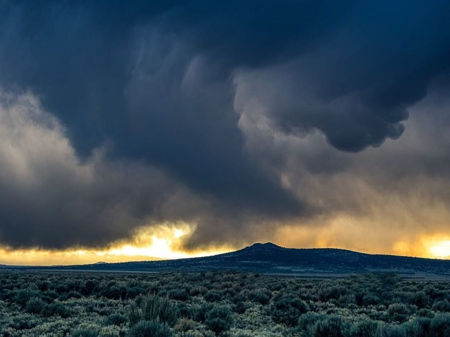 A storm moves over the mesa in northern New Mexico.