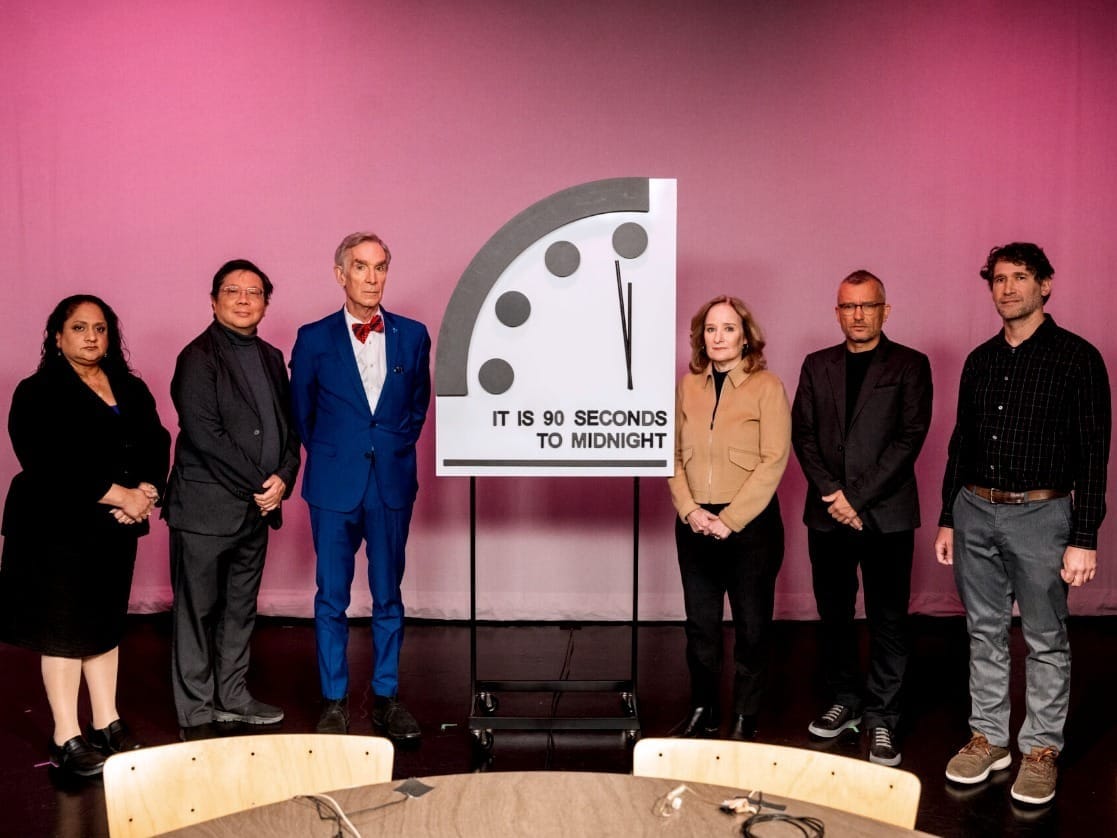 The symbolic clock warns of humanity's potential demise.