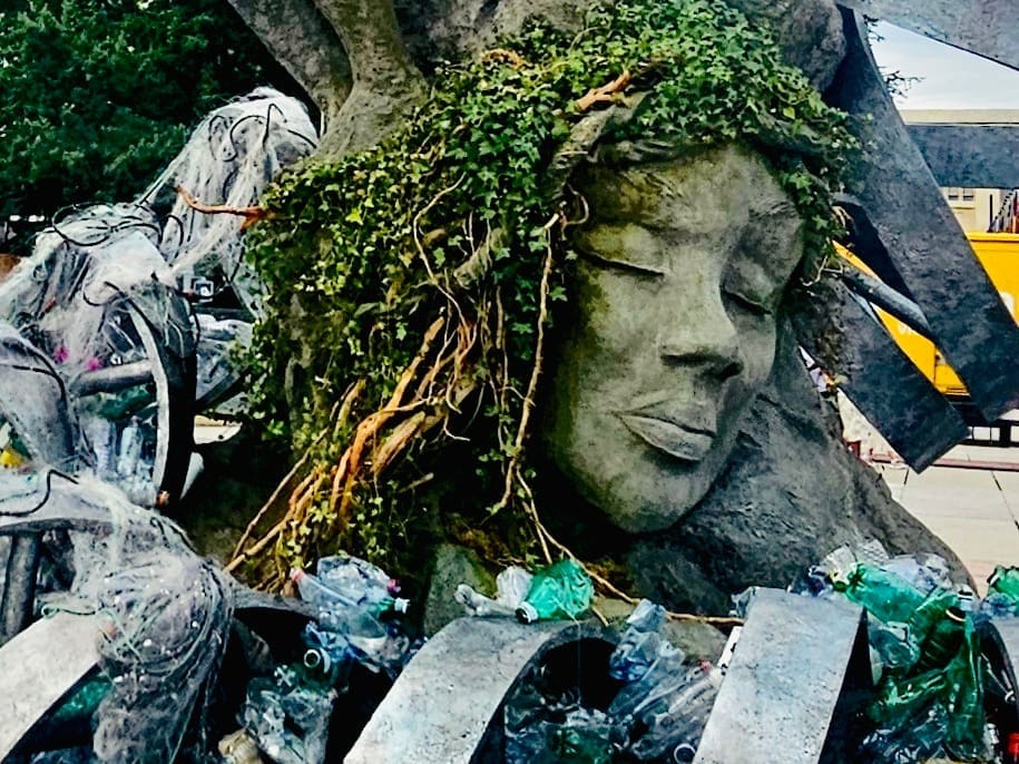 Benjamin Von Wong’s The Thinker’s Burden, an art installation surrounded by plastic trash, drew attention outside the Palais des Nations in Geneva.