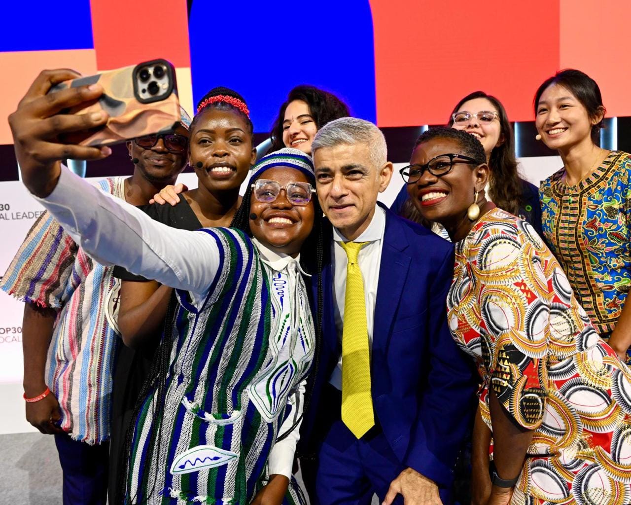 Leaders including the C40's co-chairs, London Mayor Sadiq Khan, center, and Freeport Mayor Yvonne Aki-Sawyerr, right, take a selfie at the C40 gathering in Rio de Janeiro.