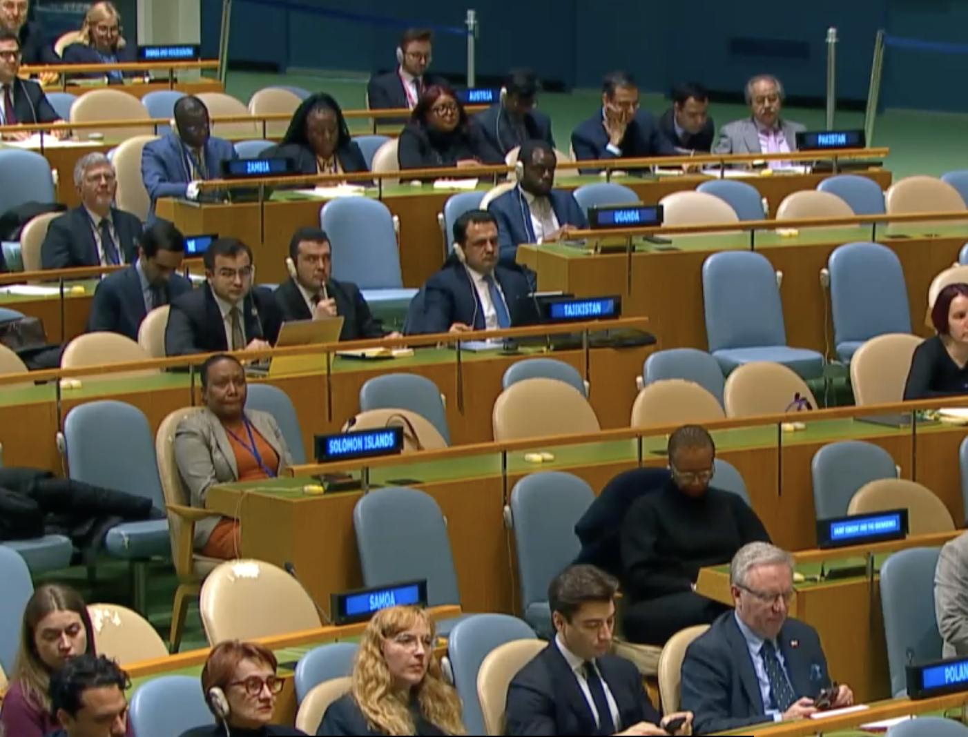 Diplomats listen to the U.N. chief's speech to the General Assembly. 