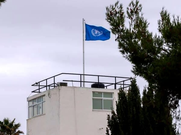 The U.N. flag is seen above the UNRWA compound in East Jerusalem.