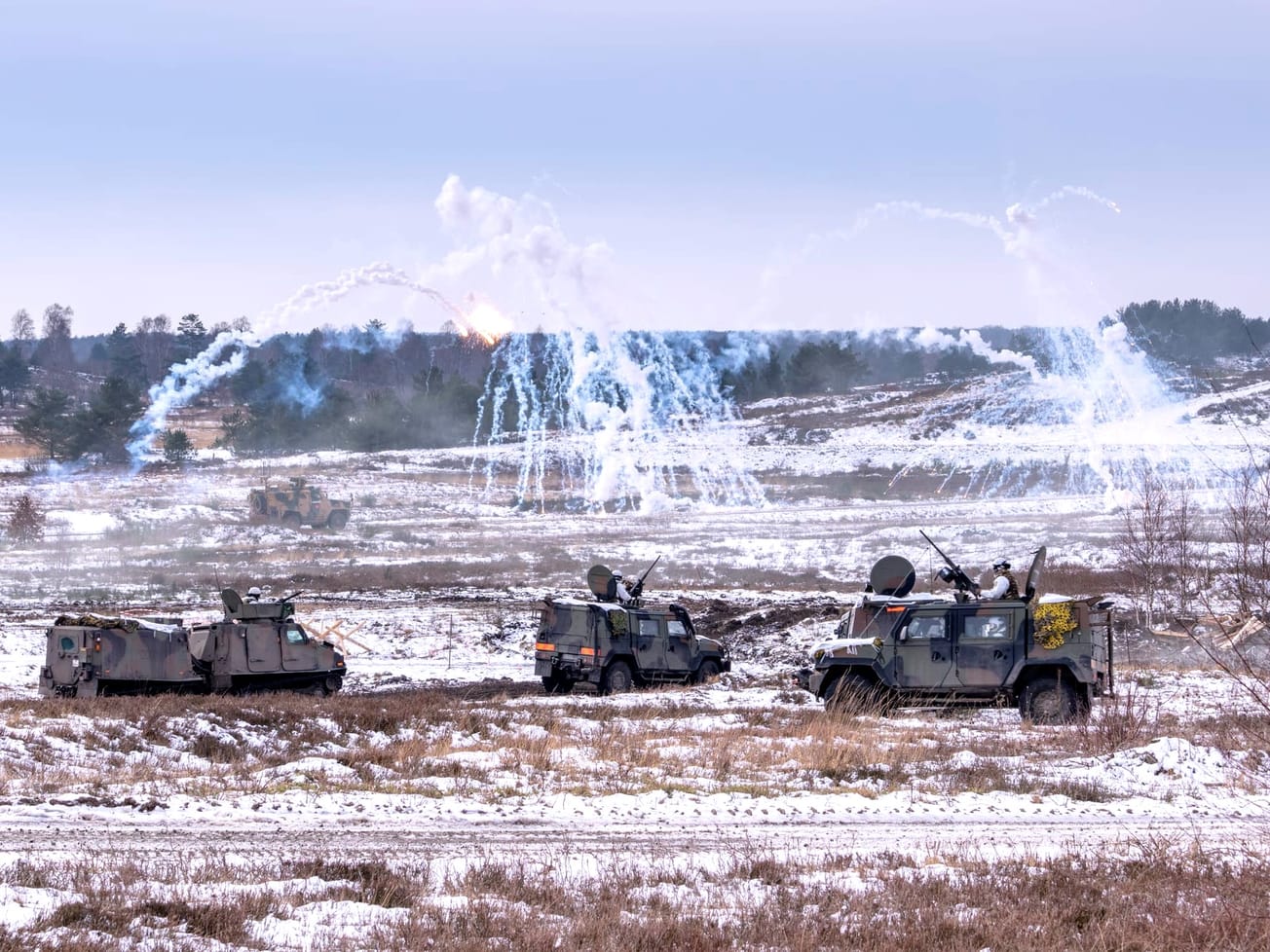 NATO troops engage targets during a live‑fire exercise on the training range during an exercise in February 2026.
